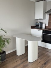 Pedestal Oval Dining Table